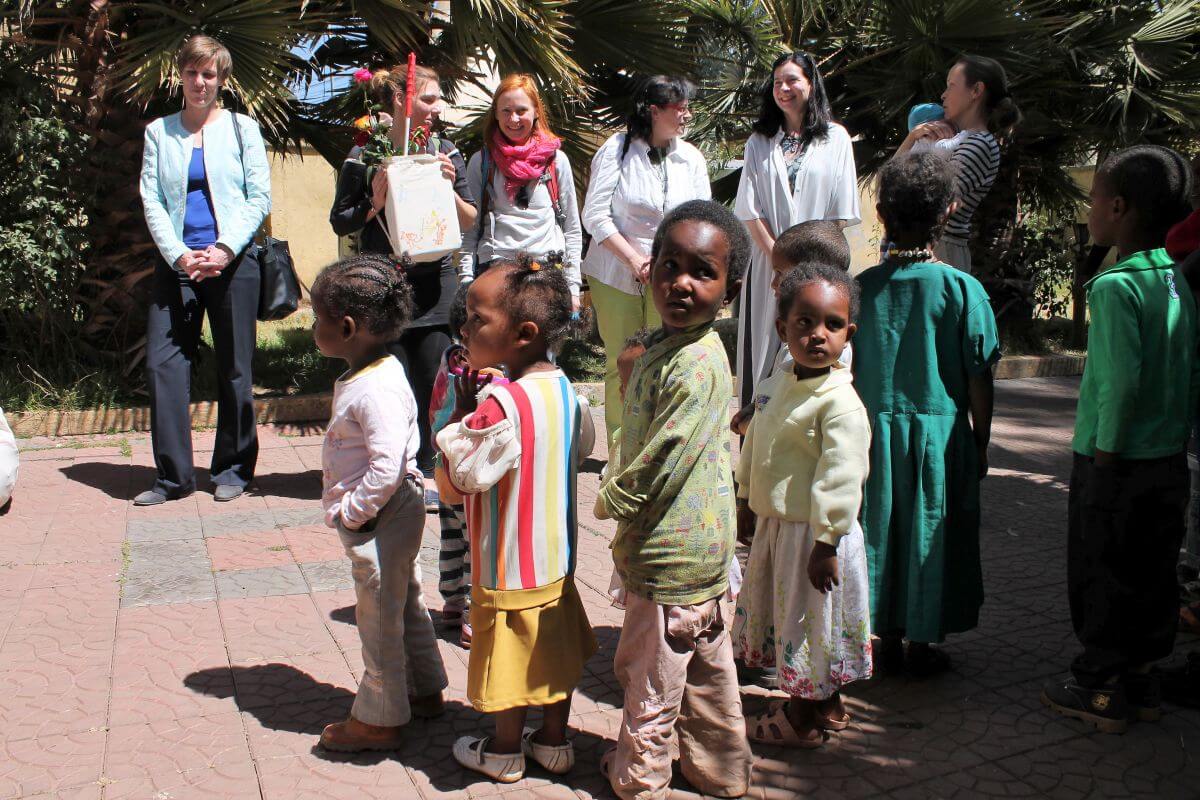 Children welcome delegation members to ‘Together!’ NGO in Addis Ababa.